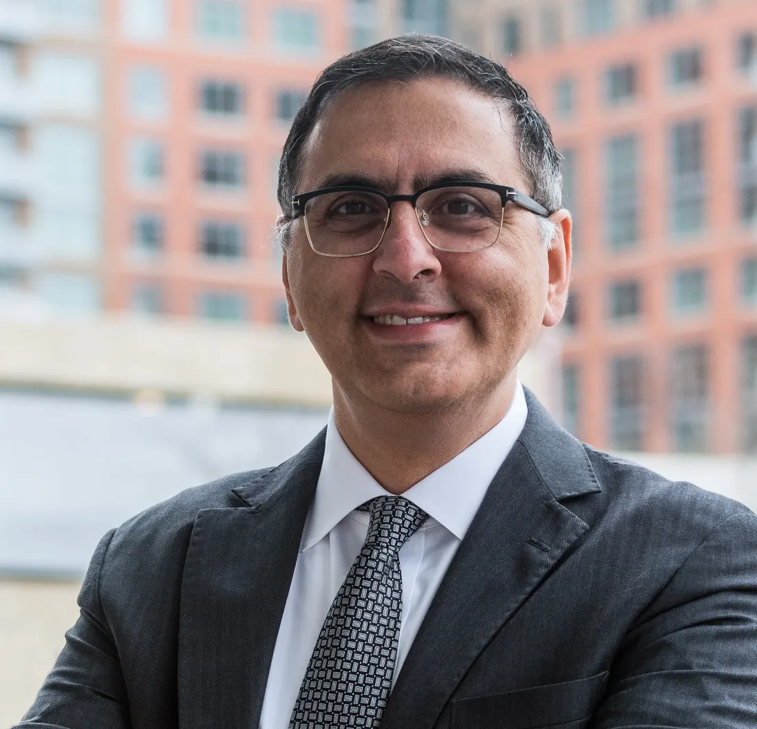 Headshot of Ebrahim Keshavarz.